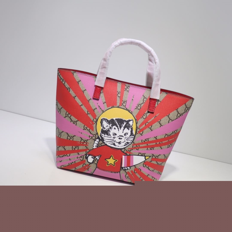 G*u*i shopping bags